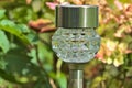 Small solar lantern in the garden Royalty Free Stock Photo