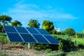 Small Solar Panel Setup Installed In Agriculture Field With Blue Sky,