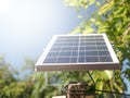 Small solar panels set on outdoor poles on a sunny day. Mini solar panel for LED spotlight in the garden Royalty Free Stock Photo