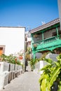 Lanscape view of small spanish town of Tejeda in gran canaria island on mountain valley on summer day with view of bentayga rock