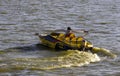 A small speed boat in Rowo Jombor lake, in Klaten, Indonesia