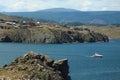 Small speedboat near shore of Baikal lake Royalty Free Stock Photo