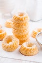 Small sponge cakes with cottage cheese. Ring cakes on white background Royalty Free Stock Photo
