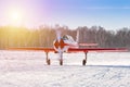 A small sports aircraft taxiing a snowy airfield Royalty Free Stock Photo