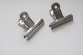 Small spring clamps made of metal Royalty Free Stock Photo