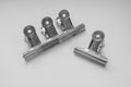 Small spring clamps made of metal Royalty Free Stock Photo