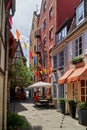 Small square with colorful historic houses in the famous Schnoor district in Bremen, Germany