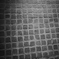 Small Square Raised Pavestone Walkway in Black and White Royalty Free Stock Photo