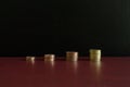 4 small stacks of money euro coins in a row Royalty Free Stock Photo