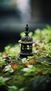 A small statue of a bird on top of a moss covered rock, AI