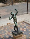 Small Statue called the Dancing Faun in Pompeii near Naples Italy
