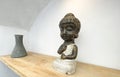 Small statue decorations for table and interior, little buddha statue modern simplistic house environment Royalty Free Stock Photo