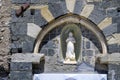 Small statue of Saint Margaret of Antioch above the entrance to the Church of Santa Margherita d`Antiochia in Vernazza, Italy