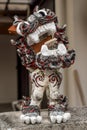 Small statue of Shisa the guardian half lion half dog idol at Okinawa Naha Japan sitting on a fence Royalty Free Stock Photo