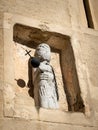 Small statue on the wall of a church