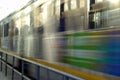 The blur of the side of a train whizzing by.