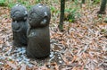 Small stone buddha monk statue