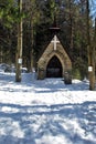 Small stone chapel in Bily kriz during winter