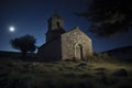 a small stone church under a starry night sky, illuminated by moonlight, surrounded by rocky terrain and a solitary tree. It Royalty Free Stock Photo