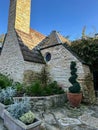 Small stone house with tall chimney Royalty Free Stock Photo