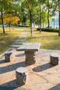 Small stone table in the park Royalty Free Stock Photo
