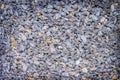 Small stone texture decorative on concrete wall for exterior grey  background Royalty Free Stock Photo
