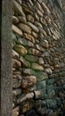 Small stone wall structure with vertical grooves Royalty Free Stock Photo