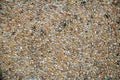 Small stones on concrete wall Royalty Free Stock Photo