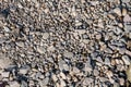 Small stones lying on the Bank of the river, the texture of pebbles