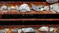 Small stones stuck in rust iron, images suitable for the background, Royalty Free Stock Photo