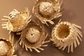 Small straw hats used for festa junina ornaments on brown background