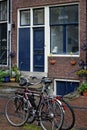 A small street in Amsterdam and bicycles near the house