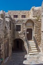 Small street in the fortress in Chora town, Naxos Island, Greece Royalty Free Stock Photo