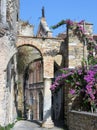 Small street with two arcs in the medieval town of Gaeta in Italy. Royalty Free Stock Photo