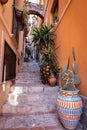 Small street of Taormina city and cactus with word SICILIA. Sicily, Italy Royalty Free Stock Photo