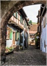 Small street in the village Riquewihr in Alsace, France Royalty Free Stock Photo