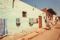 Small streets of poor indian town with brick wall houses Royalty Free Stock Photo