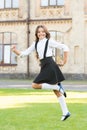 Small student girl run towards knowledge. back to school. little girl looking smart and intelligent. happy schoolgirl in