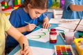 Small students children painting in art school class. Royalty Free Stock Photo