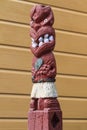 Maori wood carving of a warrior figurine, Rotorua, New Zealand Royalty Free Stock Photo