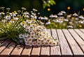 Small summer wildflowers on a wooden floor background, empty copy space, summer day, beautiful natural flowers, Royalty Free Stock Photo