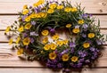 Small summer wildflowers on a wooden floor background, empty copy space, summer day, beautiful natural flowers, Royalty Free Stock Photo