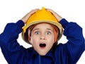 Small surprised worker with yellow helmet opening her mouth