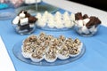 Small sweets on festive table Royalty Free Stock Photo