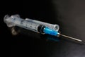 Small syringe with a needle Royalty Free Stock Photo