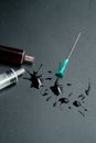 A small syringe into which a hollow, sharp-pointed bevel-cut needle is inserted Royalty Free Stock Photo