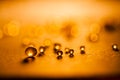 Small, tansparent balls abstract with bokeh and orange Royalty Free Stock Photo