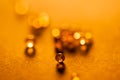 Small, tansparent balls abstract with bokeh and orange Royalty Free Stock Photo