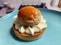 cream on the tart, small dessert, shiny glazed puff, small dessert from the manufactory, cake with cream