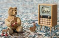 Small teddy bear watch cartoons in the television - scene with old toys Royalty Free Stock Photo